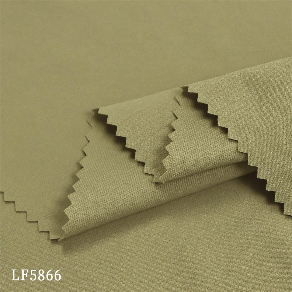 Puntos de Perla Tela Jacquard rehegua